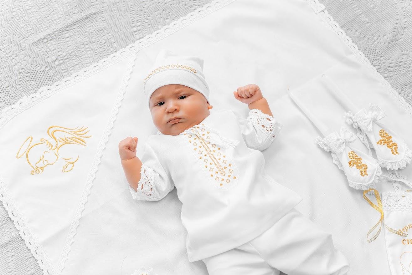 Elegant linen baptism set for baby boy with delicate gold embroidery