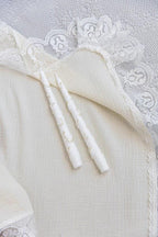Baby girl christening outfit in ivory muslin fabric