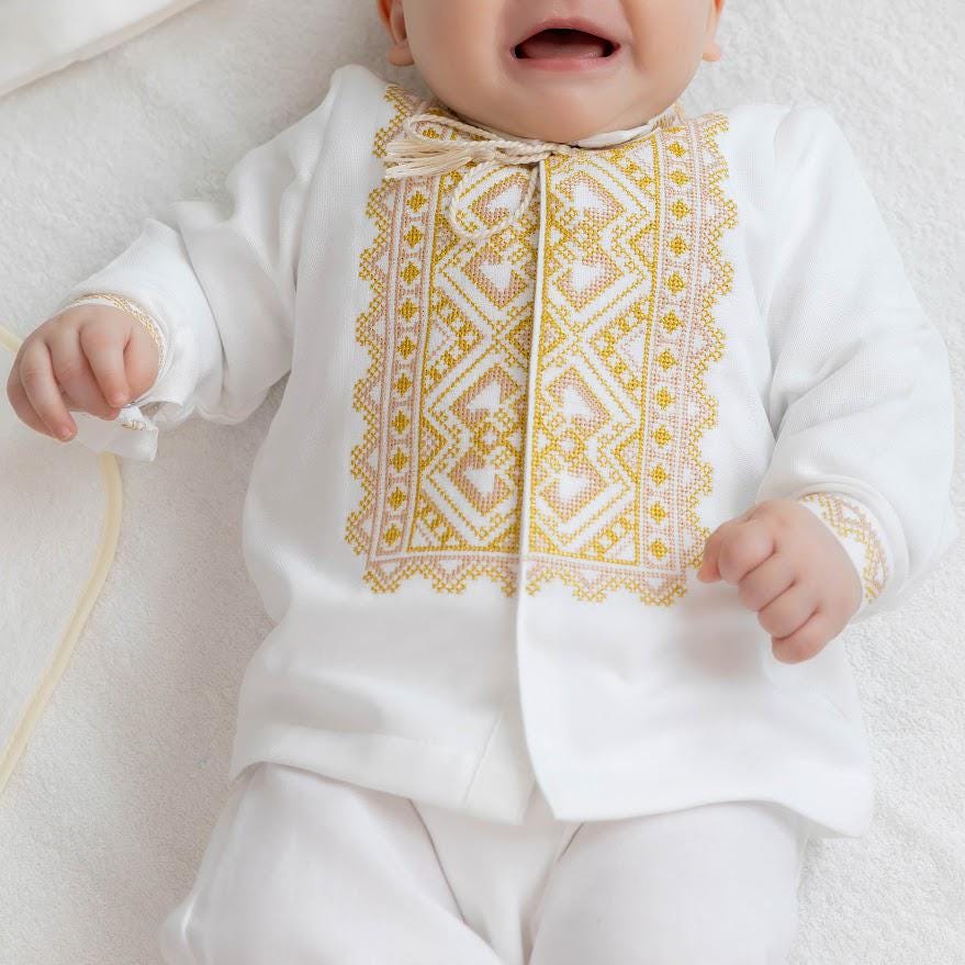 Elegant linen christening outfit with embroidered shirt and baby accessories