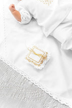 Elegant linen baptism set for baby boy with delicate gold embroidery