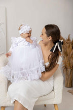 Infant baptism gown in white with embroidered lace details