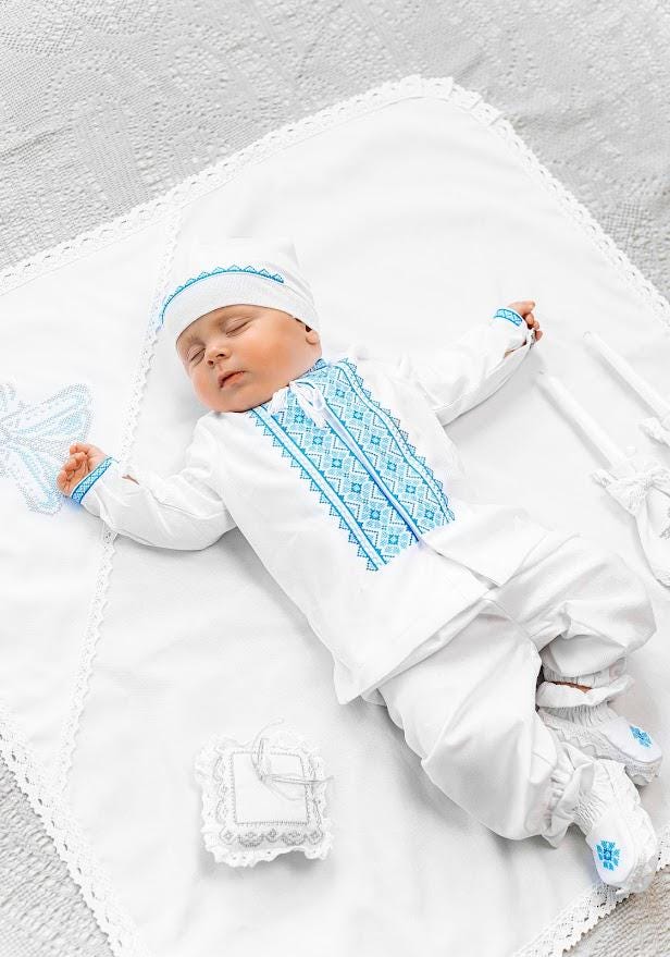 Complete baptism set with candles, cross pillow and baby outfit
