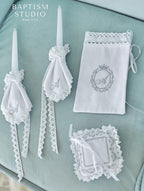 Personalized embroidered monogram on linen baptism set – custom baby christening keepsake.