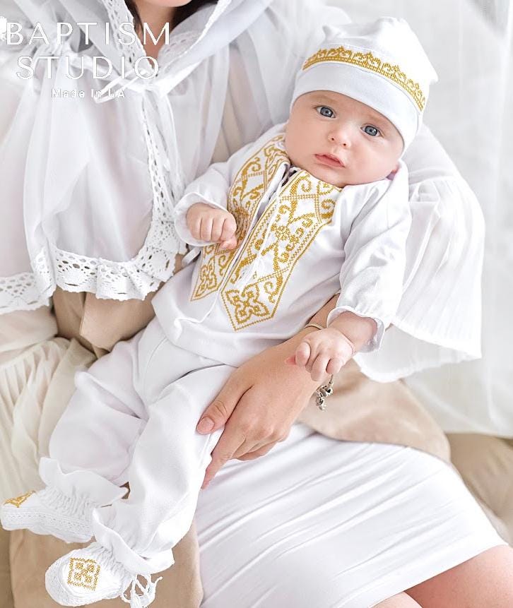 White baby baptism outfit with gold embroidered shirt and pants