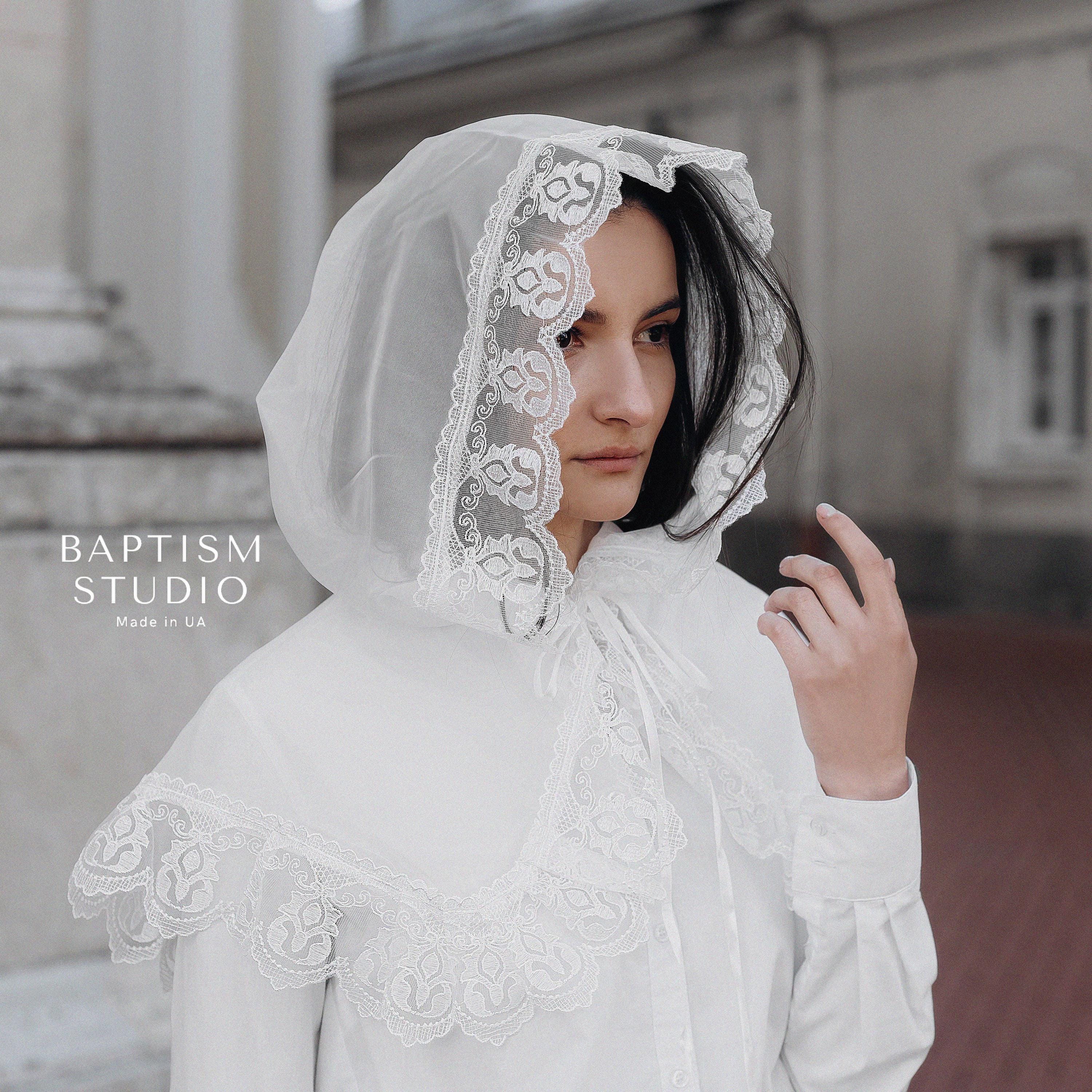 Woman wearing white lace baptism veil handmade in Ukraine