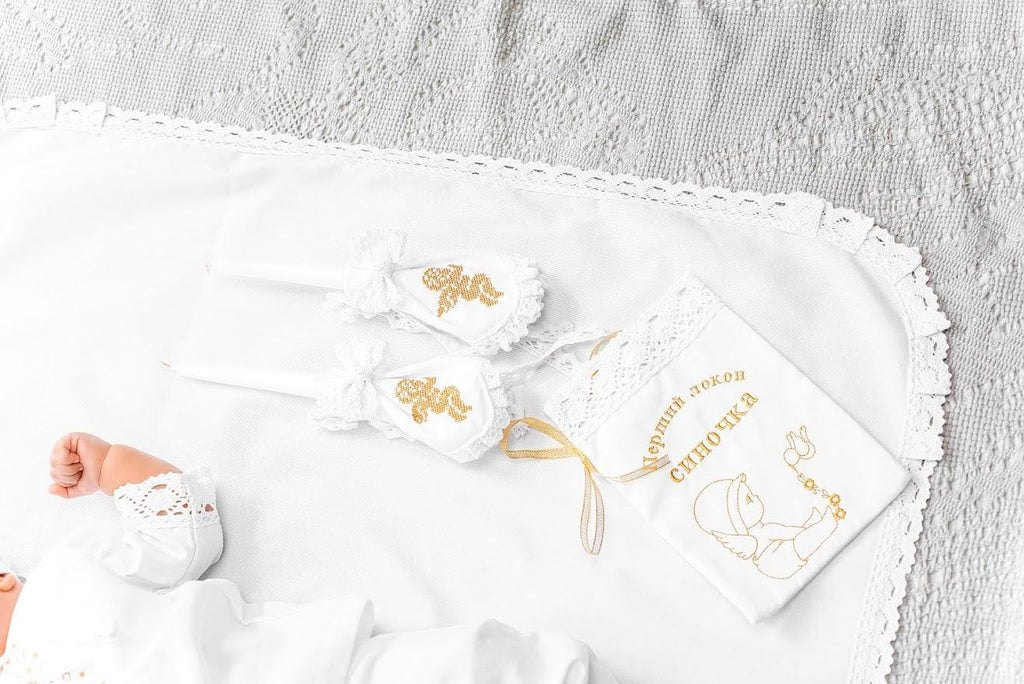 Elegant linen baptism set for baby boy with delicate gold embroidery