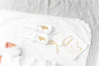 Elegant linen baptism set for baby boy with delicate gold embroidery