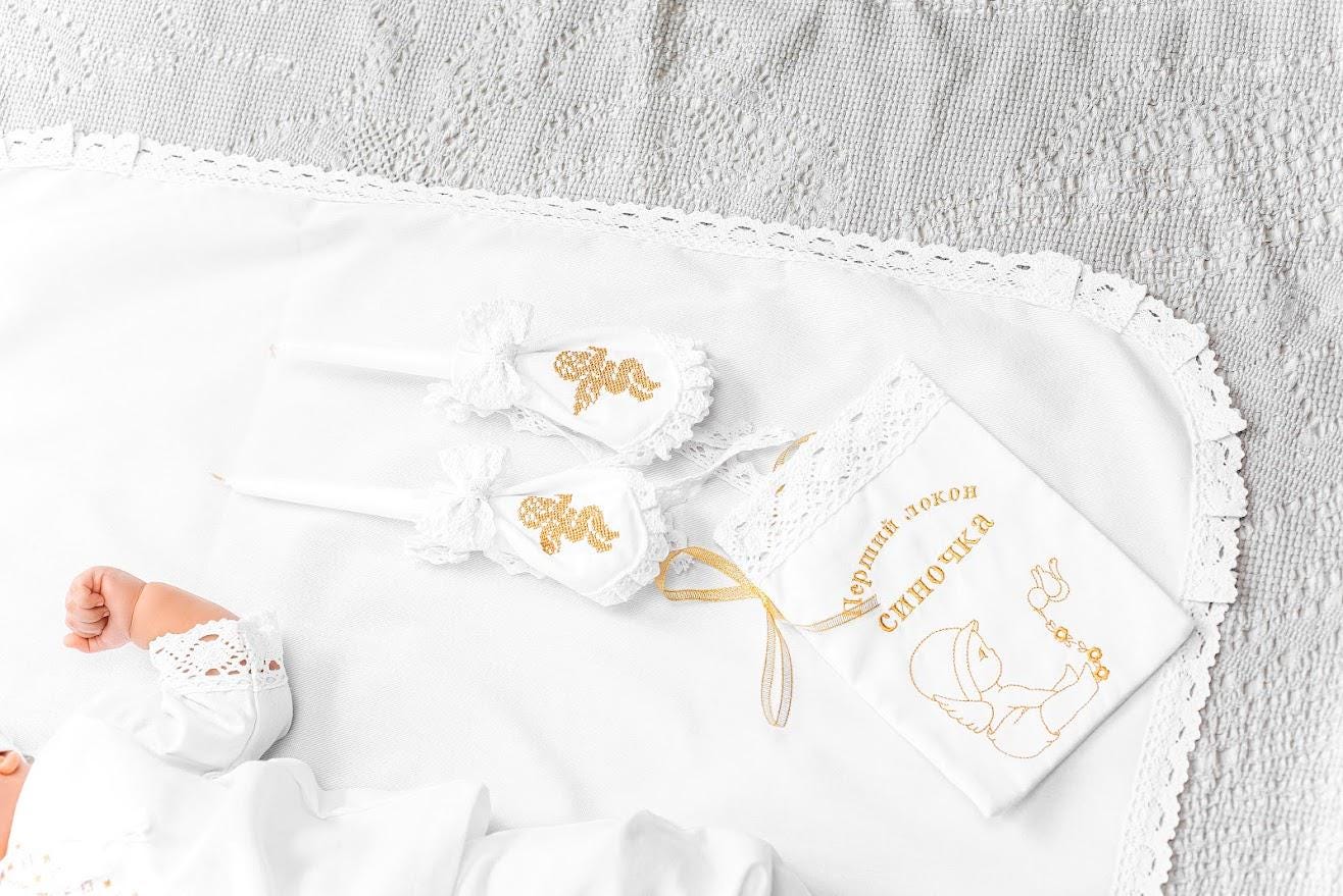 Elegant linen baptism set for baby boy with delicate gold embroidery